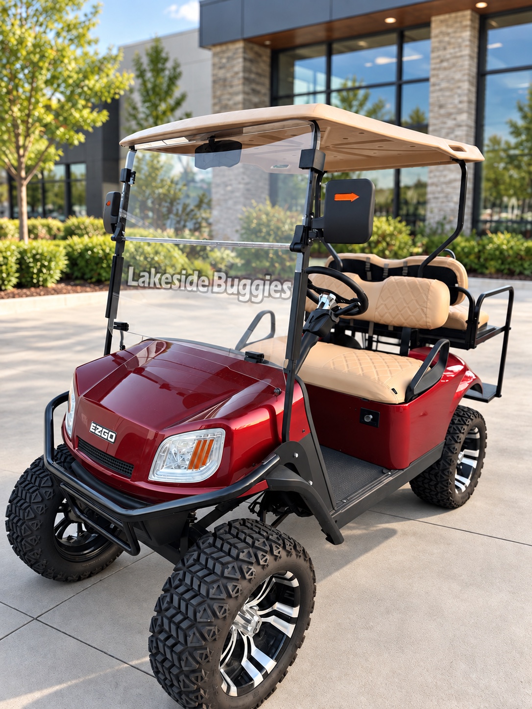 Photo 2 of 8: Front view of the red lifted E-Z-GO TXT