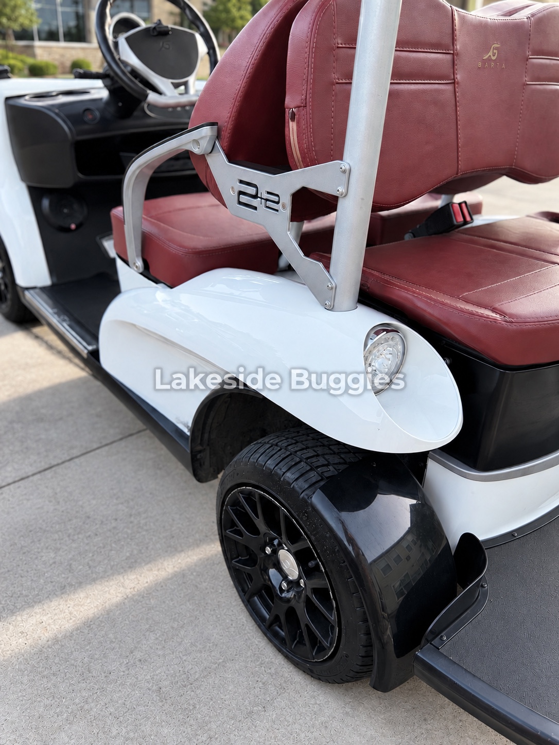 Photo 5 of 9: Rear passenger area and black wheel